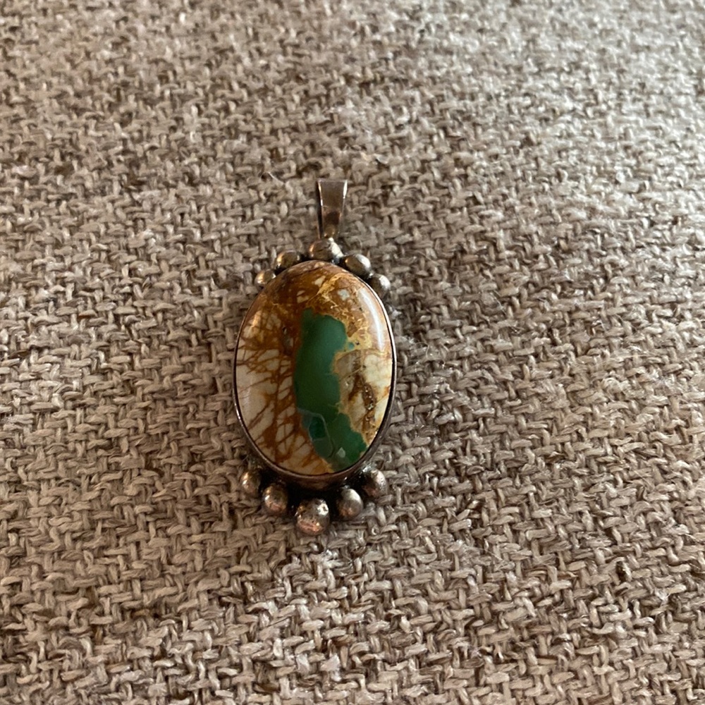 Authentic turquoise pendant signed and stamped sterling silver!